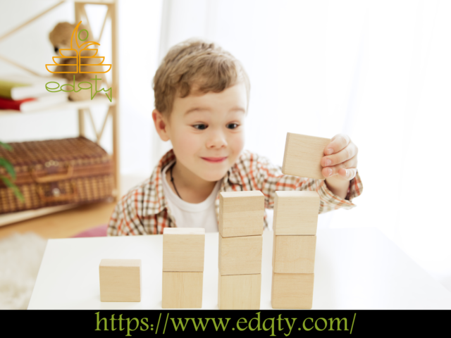 A young child playing with building blocks developing cognitive abilities in child development through problem-solving and creativity