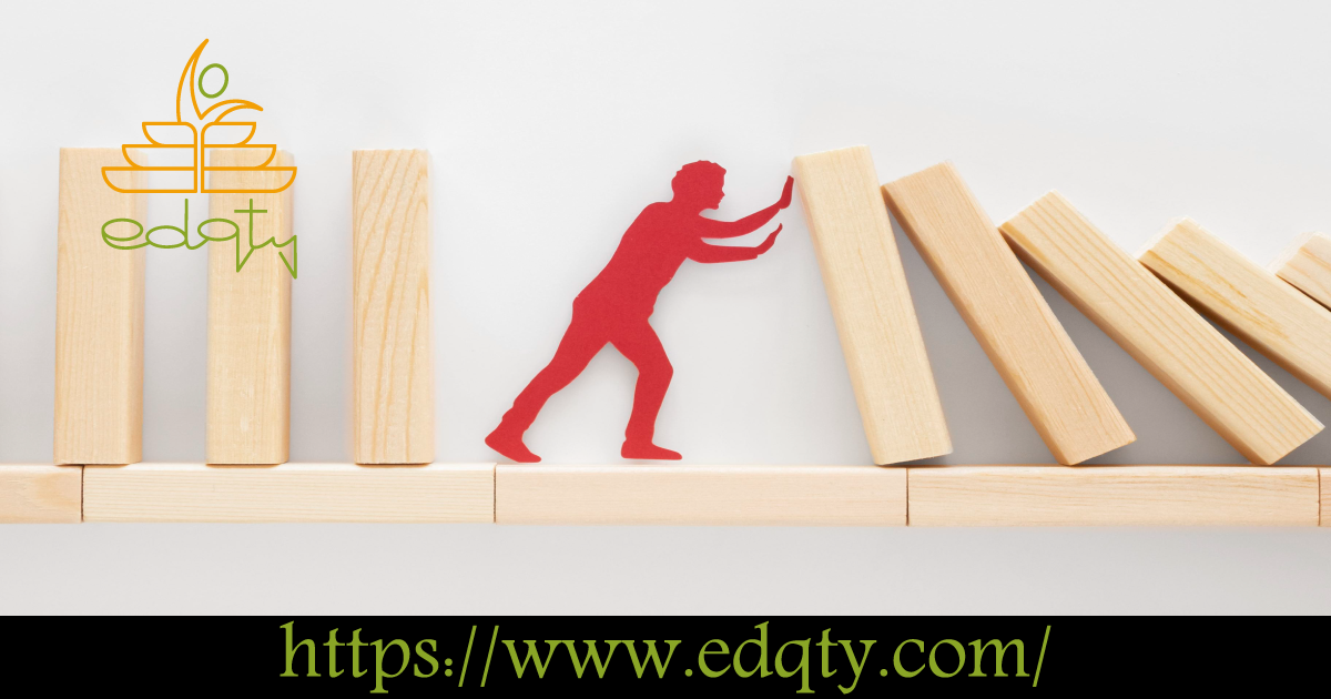 Red silhouette pushing falling wooden blocks symbolizing overcoming challenges