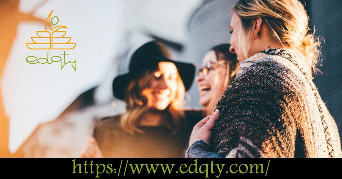 Group of friends laughing together representing the balance of social connections and structured routines in dorm life abroad